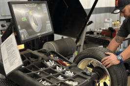 Tire rotation being performed at Mundo Auto Repair for optimal vehicle performance.