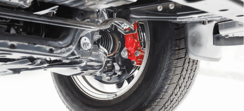 Suspension system components visible beneath the vehicle.