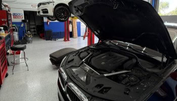 High-performance car engine being serviced at Meisterwerks garage.
