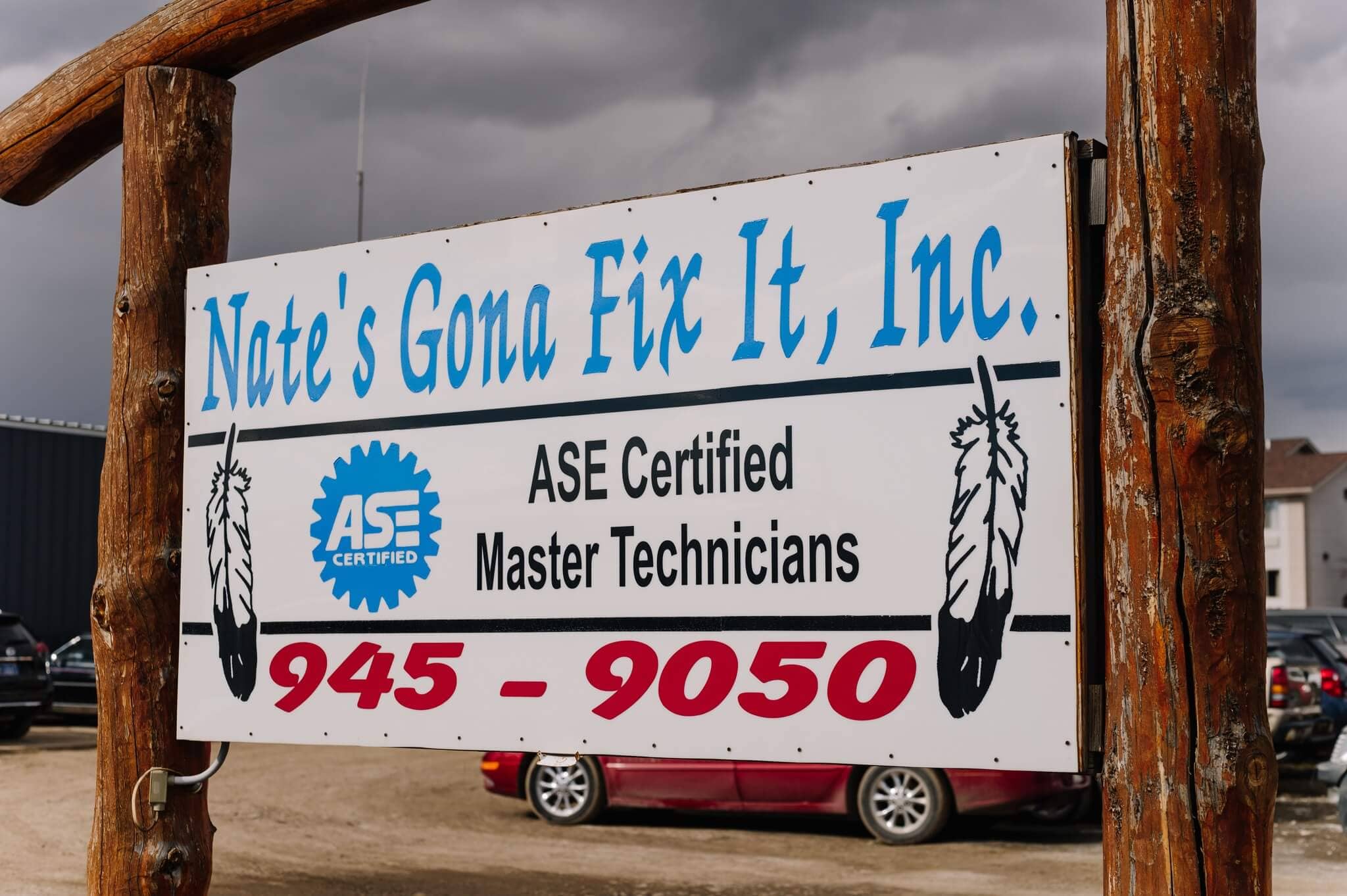 Sign for Nate’s Gona Fix It, Inc. with contact number 945-9050.