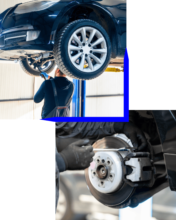 Technician inspecting a car's undercarriage in a professional auto repair shop.