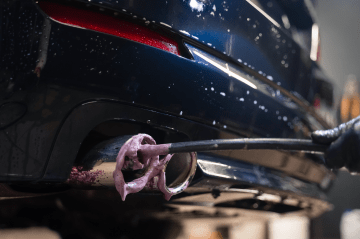 Car oil change service at One Stop Lube, expert vehicle maintenance and oil replacement.