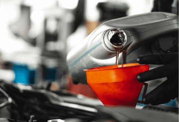 Oil change service at One Stop Lube, auto care experts.