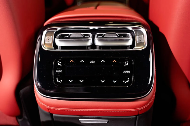 Car AC vent control panel for efficient cooling in Florida heat.