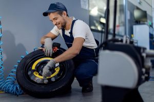 Mechanic performing tire repair