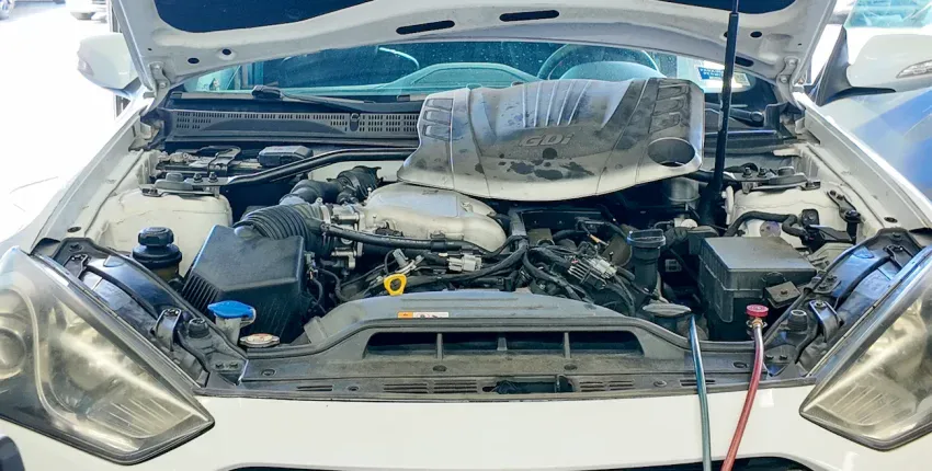 Hyundai auto repair shop in Orlando — ASE Master certified technician servicing a vehicle at Orlando Auto Repair on W Colonial Dr