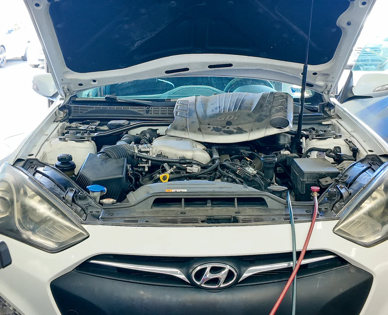 Hyundai auto repair shop in Orlando — ASE Master certified technician servicing a vehicle at Orlando Auto Repair on W Colonial Dr