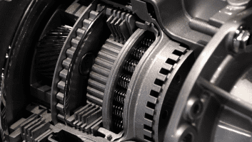 Close-up of diesel truck transmission gears and components.