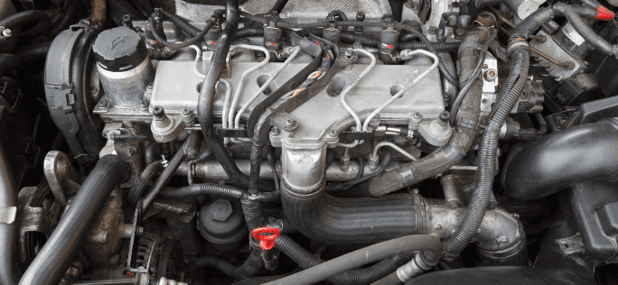Close-up of a diesel engine showing repair and maintenance components.