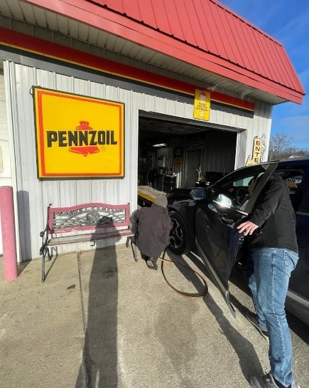 Auto repair and oil change service at Parney’s Car Care, featuring Pennzoil products.