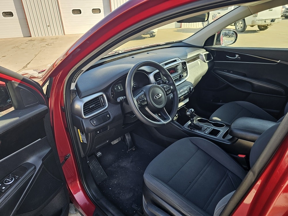 Interior view of a modern vehicle at Pembina Valley Auto dealership.