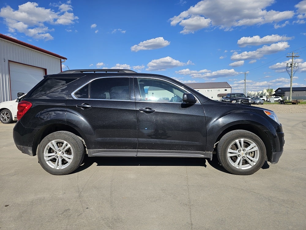 Black SUV for sale at Pembina Valley Auto dealership.