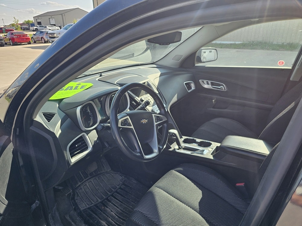 Interior view of a Chevrolet vehicle showing the dashboard and steering wheel.