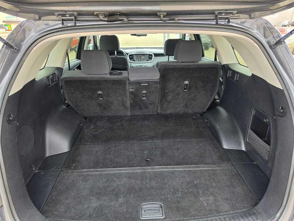 SUV cargo area with spacious interior and foldable rear seats.