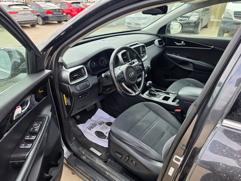 Jeep vehicle interior showcasing a sleek dashboard and comfortable seating. Perfect for drivers seek.