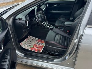 Modern car interior with black seats and dashboard at Pembina Valley Auto.