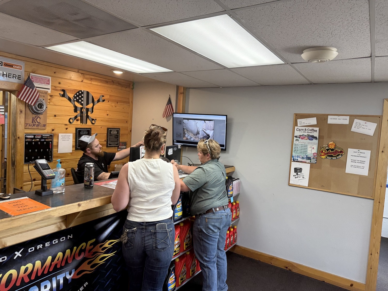 Friendly staff assisting customers at Performance Authority in Bend, Oregon.