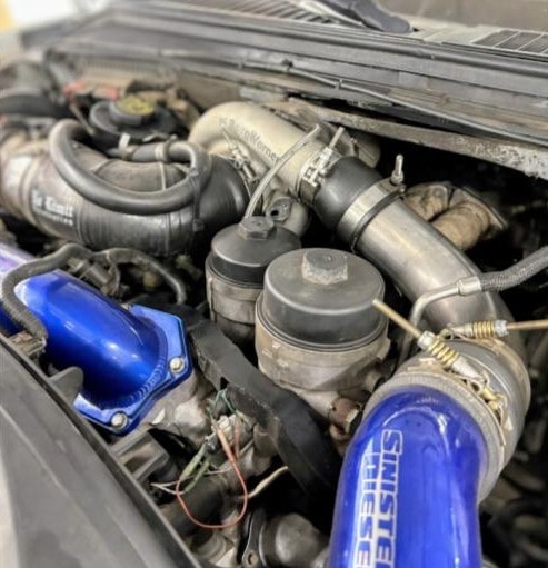 High-performance turbocharged engine with aftermarket parts for enhanced power and efficiency.