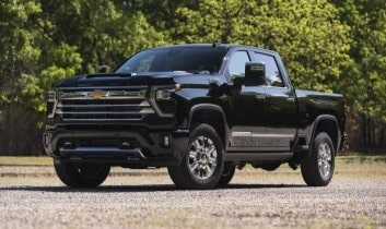 Black pickup truck with modern design and chrome accents, ideal for performance and durability.