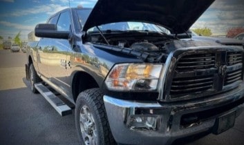 Black RAM truck with open hood at Performance Authority in Bend, OR.