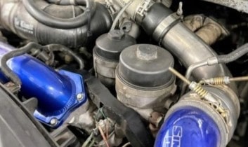 Close-up of high-performance engine parts at Performance Authority Bend.