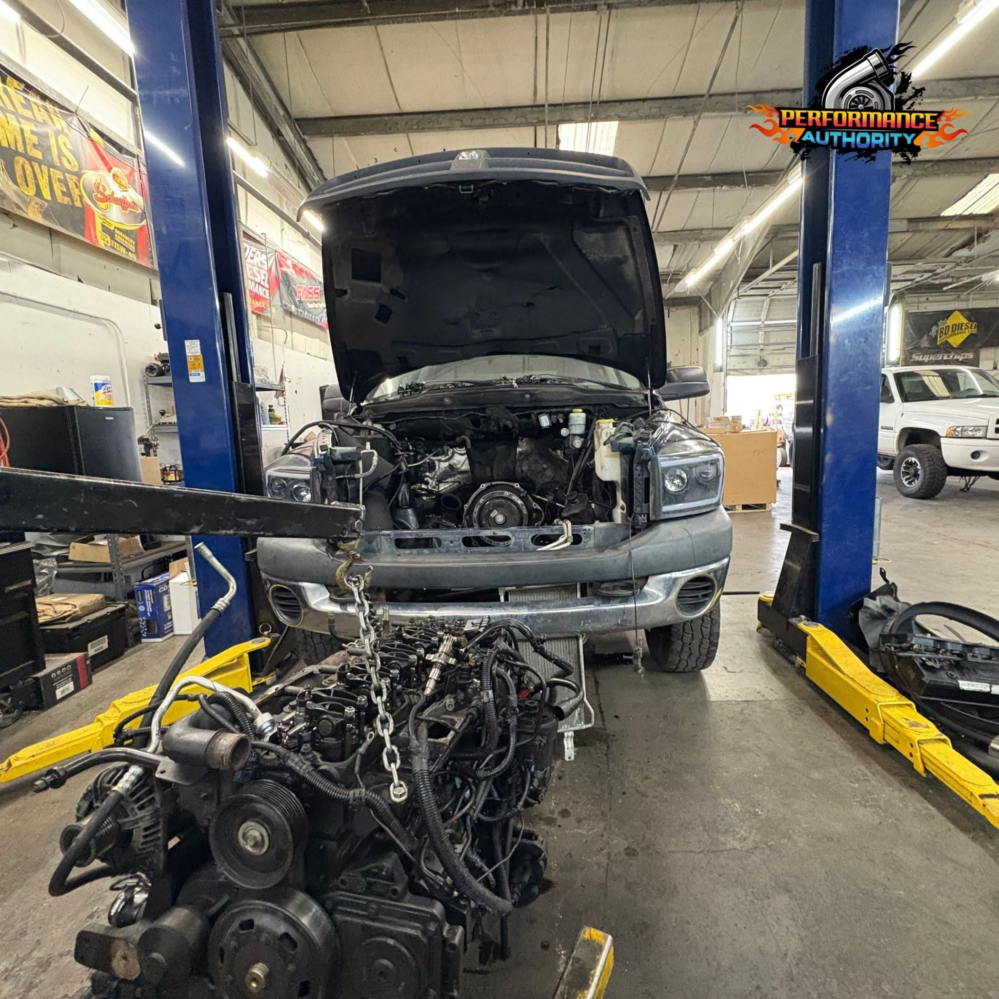 Engine removal for performance upgrade or repair.