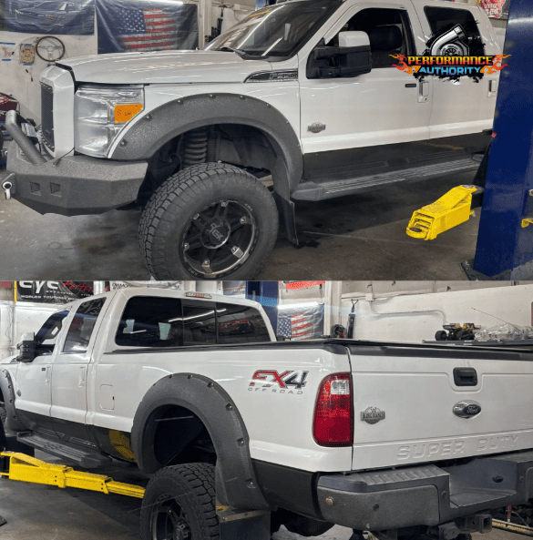 White Ford Super Duty truck undergoing performance upgrades at Bend auto shop.