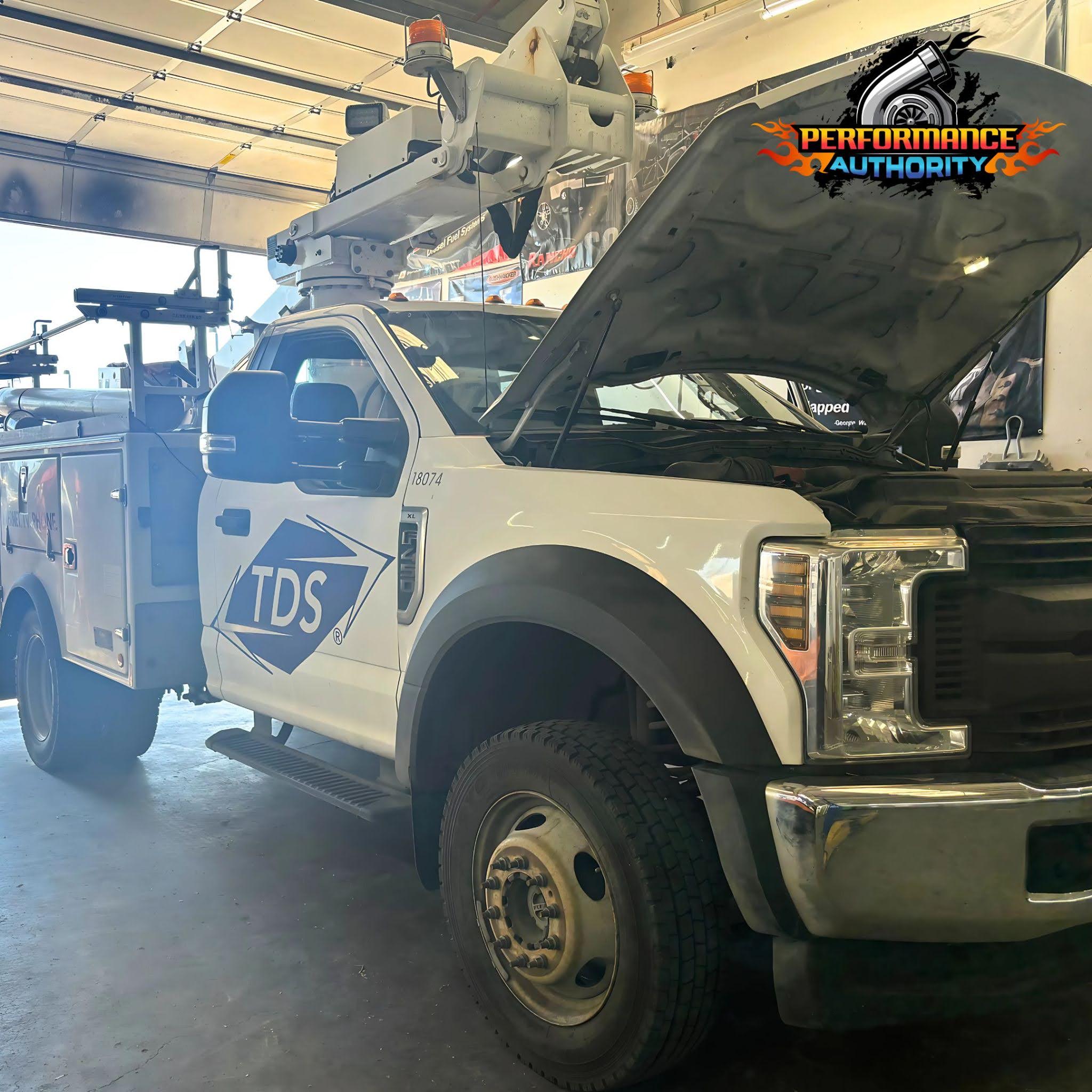 Service truck with open hood at Performance Authority, Bend, OR.