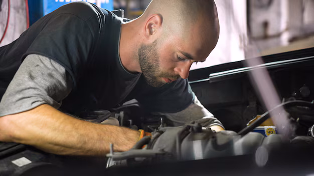 auto-mechanic-repairs-suv-engine-auto-repair-station-automobile
