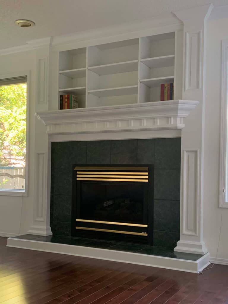 Modern fireplace with built-in shelves