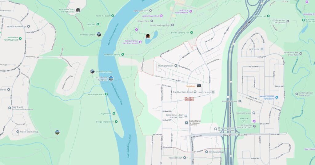 A detailed map of Riverfront Park and surrounding area, showing pathways, boat ramps, playgrounds, and nearby landmarks along the North Saskatchewan River in Calgary.
