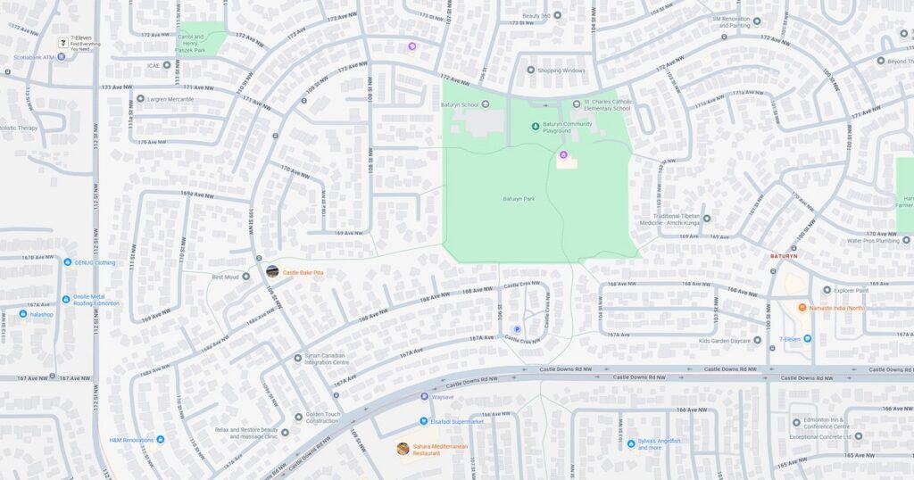 A detailed map of a city park highlighting walking trails, green areas, and surrounding streets for visitors and residents.