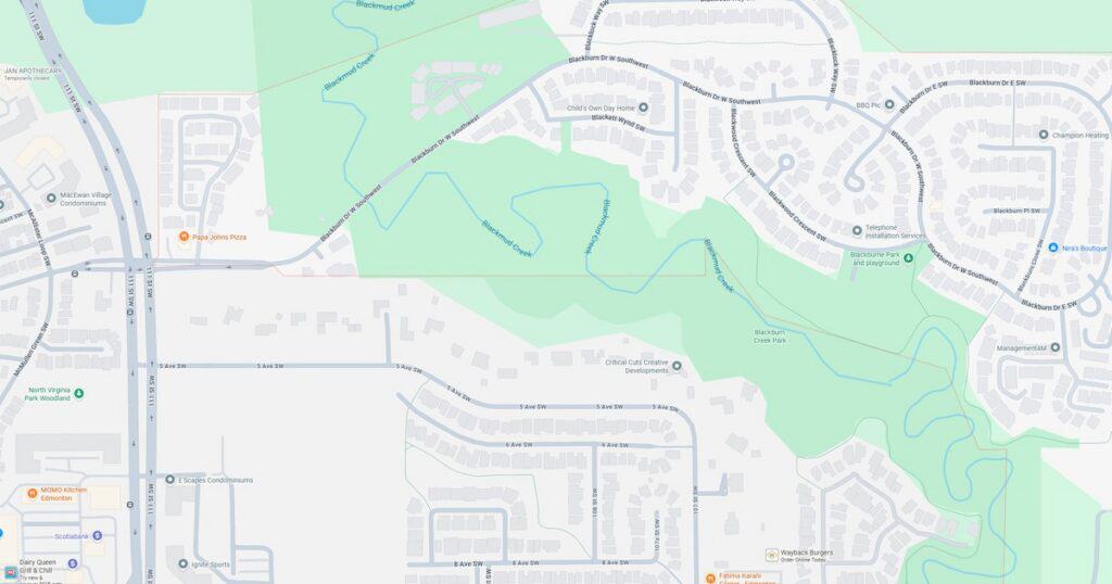 Detailed map of a suburban residential area showing streets, parks, and natural features for navigation and location reference.