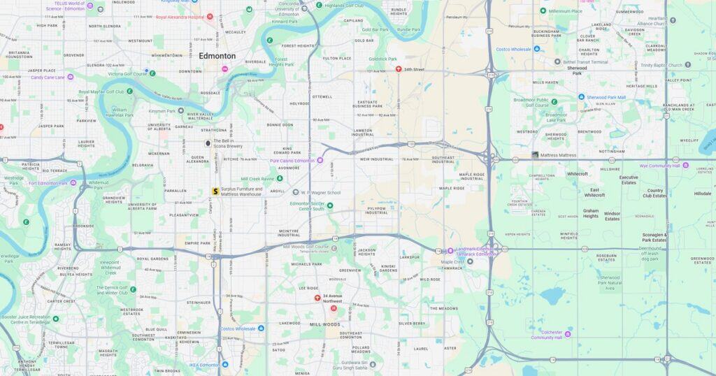Detailed map of Edmonton, Alberta, showing major streets, neighborhoods, parks, and waterways in the city.