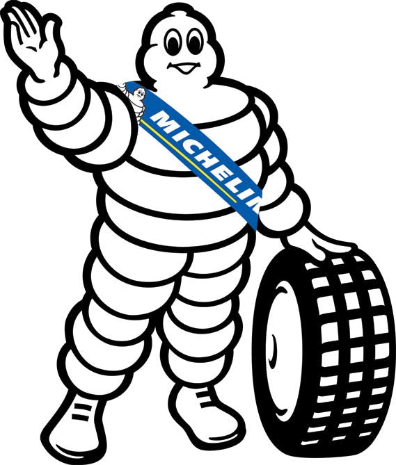 Michelin Man holding a tire, promoting tire services at Pittstop Auto Care.