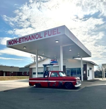 Non-ethanol fuel station with vintage truck at POPS FULL SERVICE.