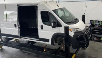 Commercial auto repair van at Premier Auto Care LLC workshop.