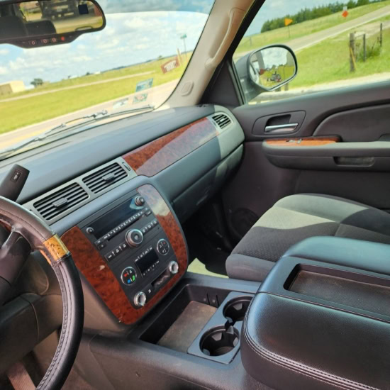 Auto dashboard and front passenger seat in a vehicle.