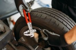 Tire mounting and balancing process at Price Tires & Wheels.