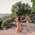Couple laughing while running at Mount Srđ Dubrovnik