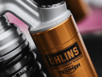Ohlins Triumph suspension fork close-up.