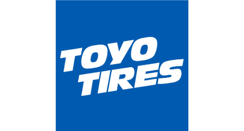 Toyo Tires displayed at Qwik Oil & Auto Care service center.