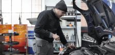 Engine inspection at Rapid Fleet Service for optimal vehicle performance.