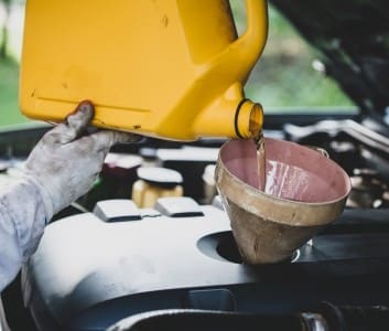 Vehicle oil change and fluid top-up for fleet vehicles.