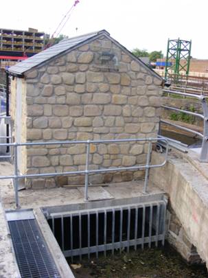 The intake side of an Archimedean screw installation