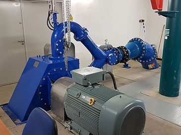 View of the Pelton turbine inside the turbine house