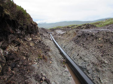 Laying the penstock prior to backfilling