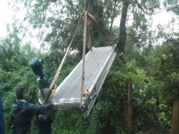 Lifting the GoFlo screen into position