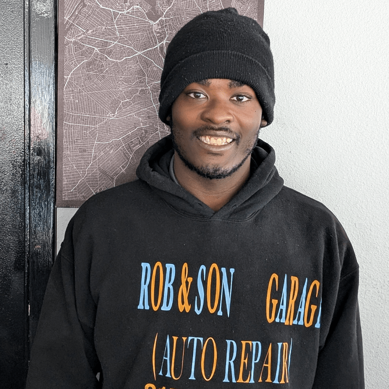 A friendly technician from Rob & Son Garage ready to assist with vehicle repairs.