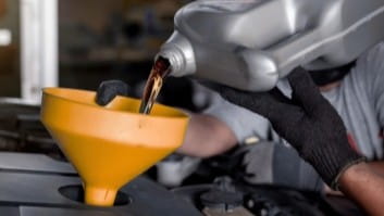 Oil change, vehicle maintenance, auto repair service.